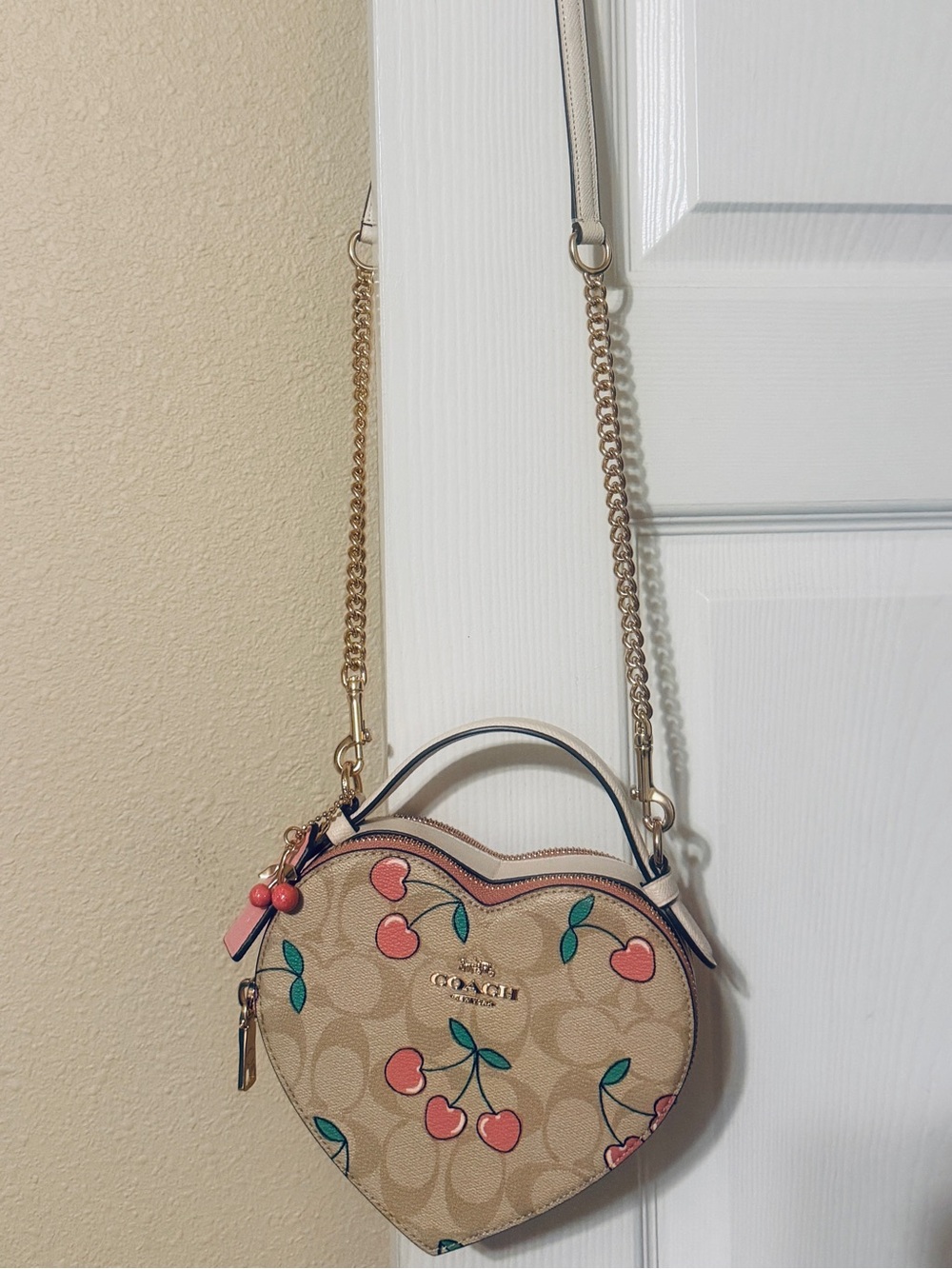 Coach Heart Cherry Crossbody in Tan with Pink and Green Accents
